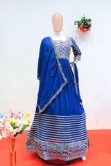 Royal blue gown with intricate silver embroidery