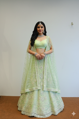 Pista Green Net Lehenga With Flower Work