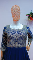 Royal blue gown with intricate silver embroidery