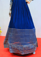 Royal blue gown with intricate silver embroidery