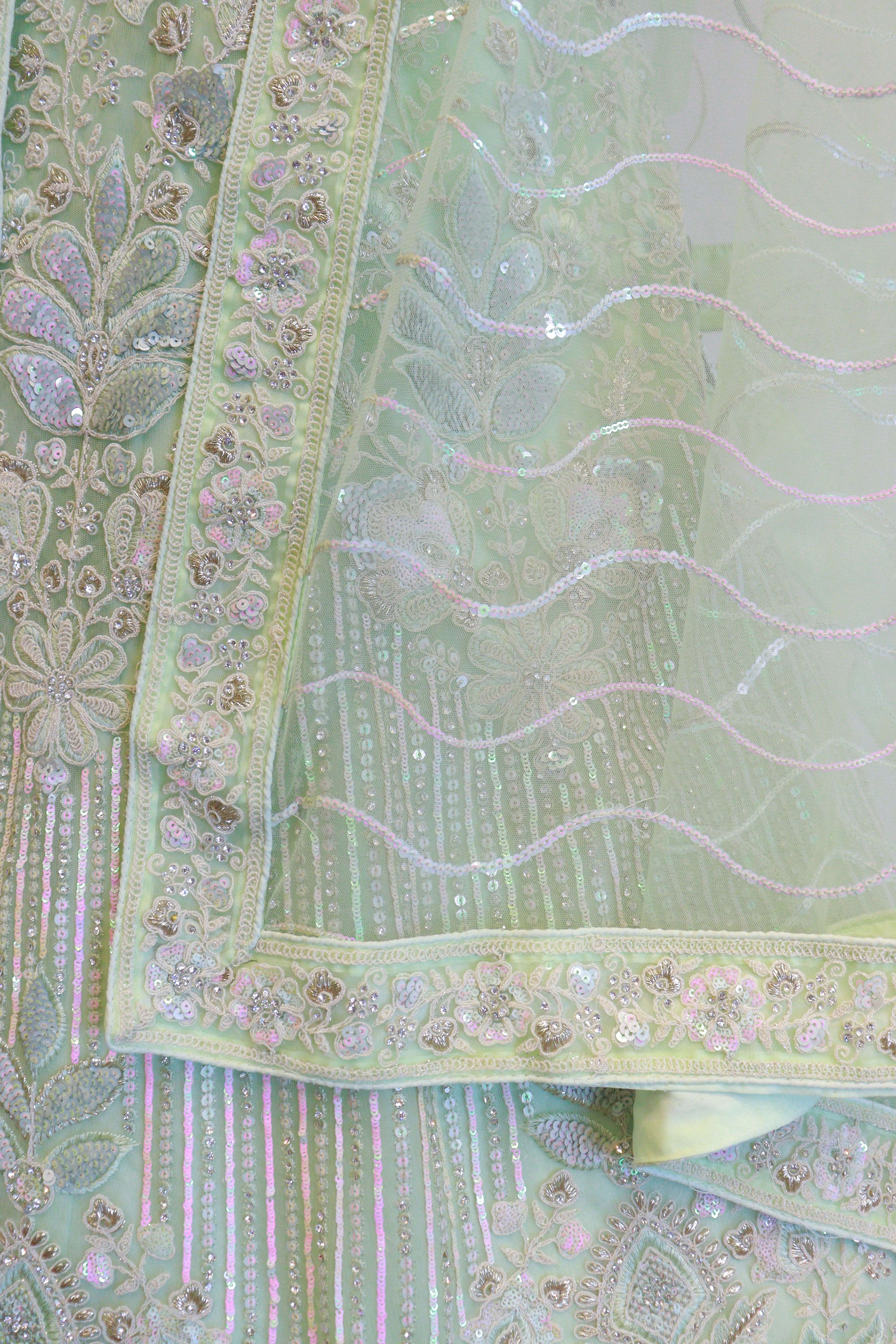 Pista Green Net Lehenga With Flower Work