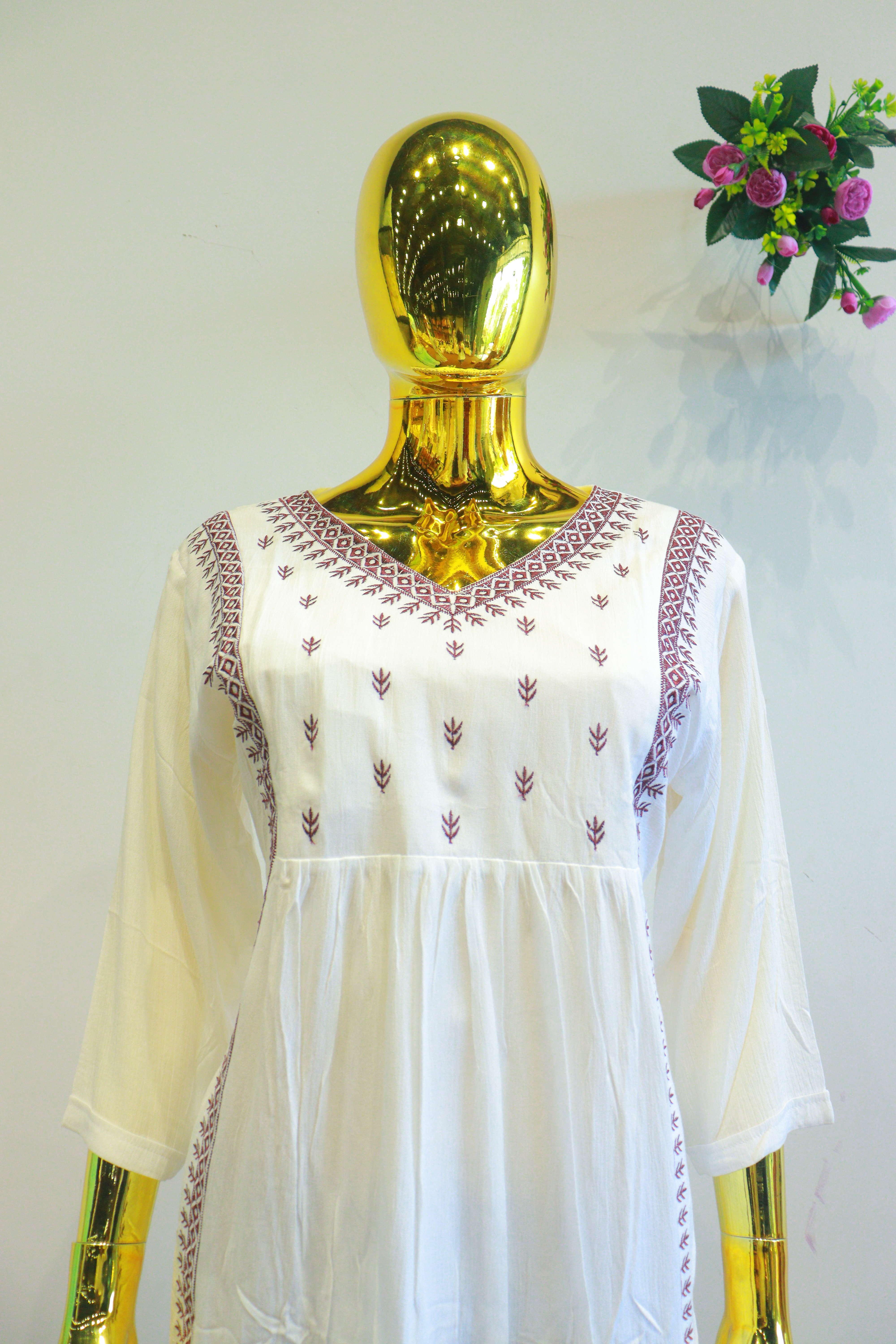 White Lilan Slub Top With Embroidery Work
