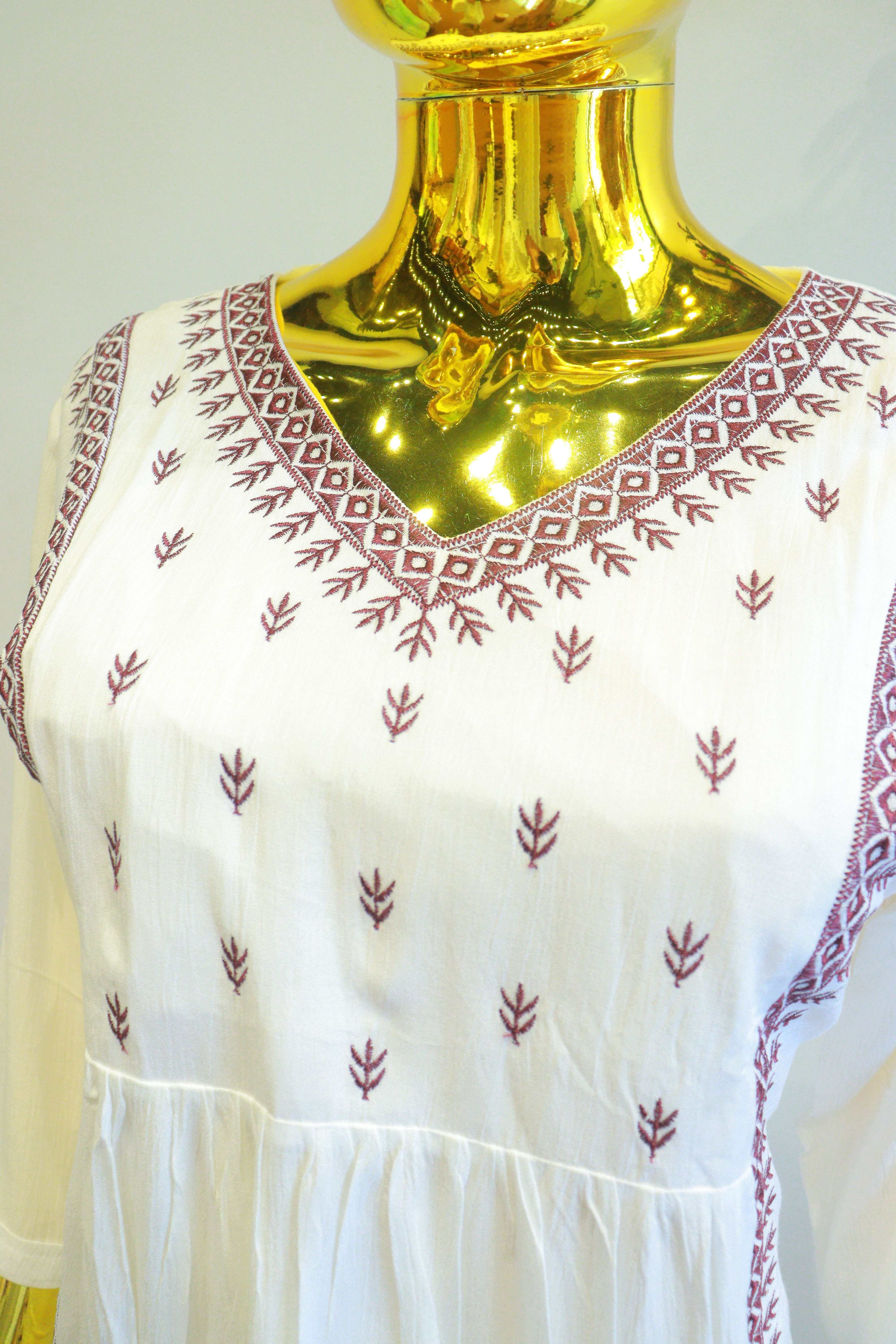 White Lilan Slub Top With Embroidery Work