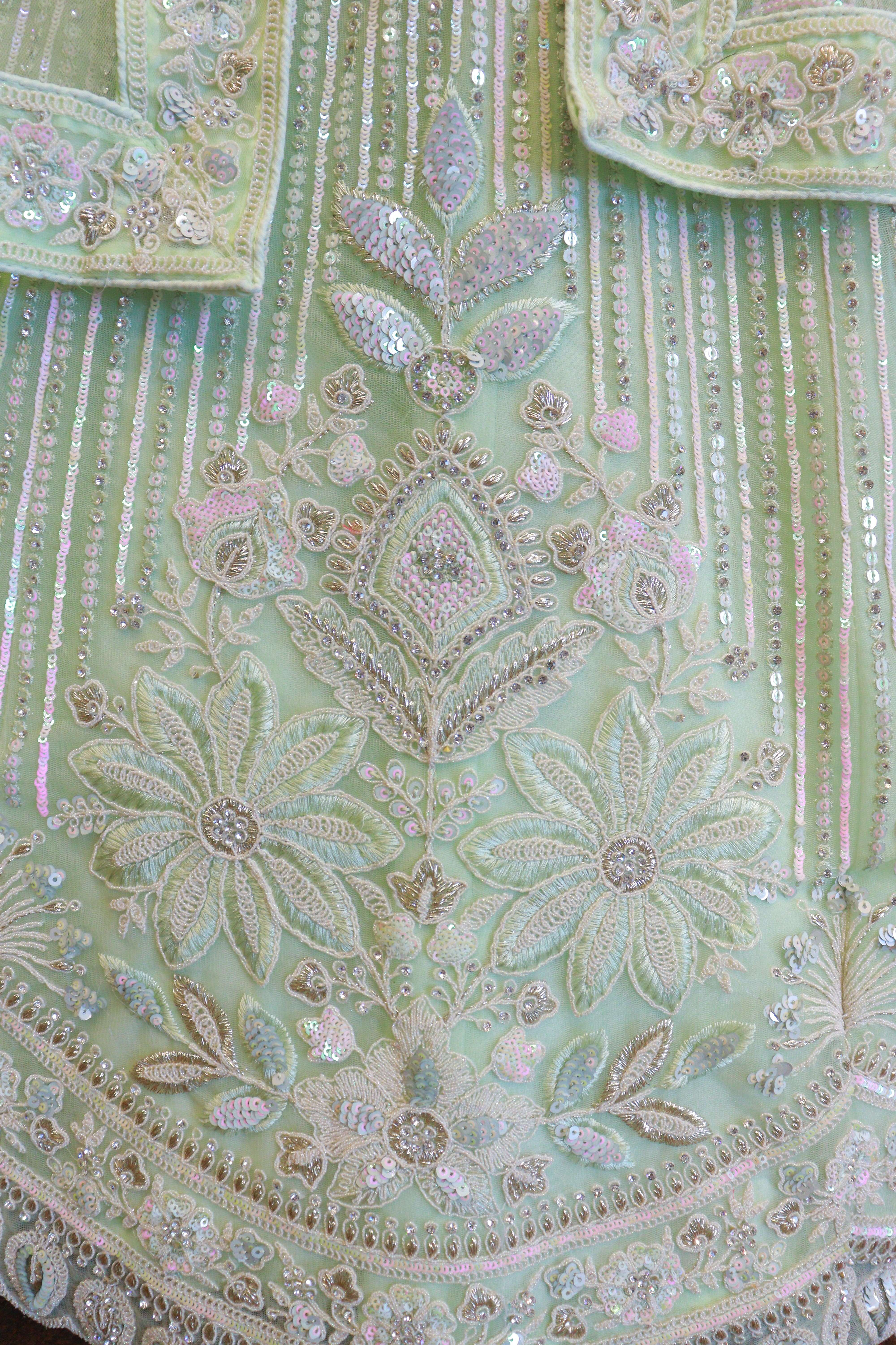 Pista Green Net Lehenga With Flower Work