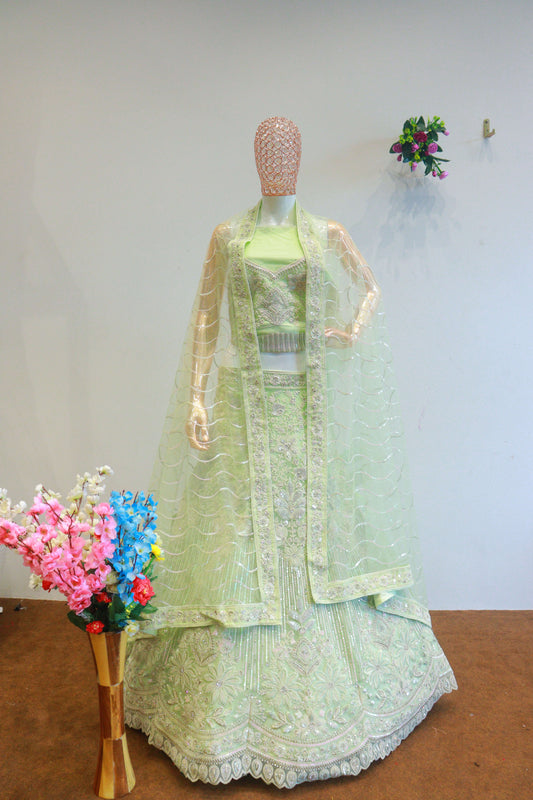 Pista Green Net Lehenga With Flower Work