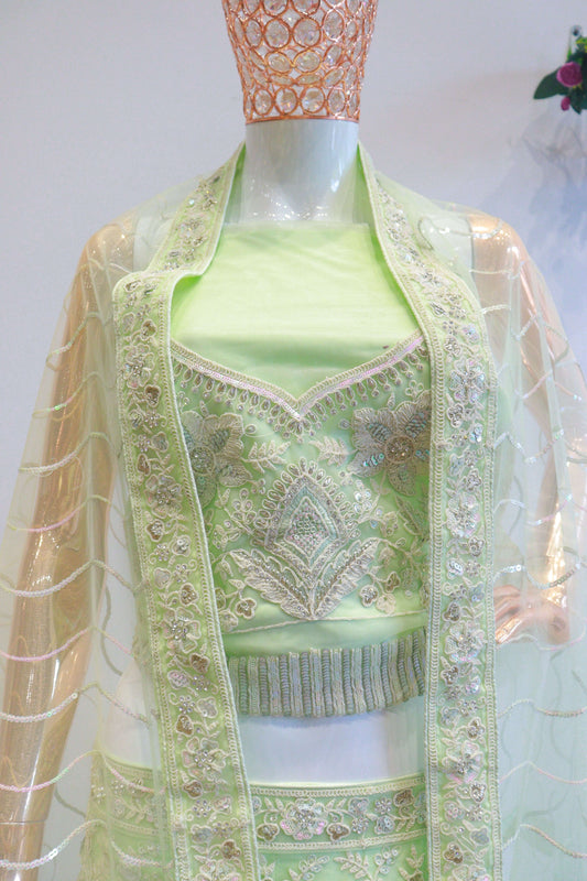 Pista Green Net Lehenga With Flower Work